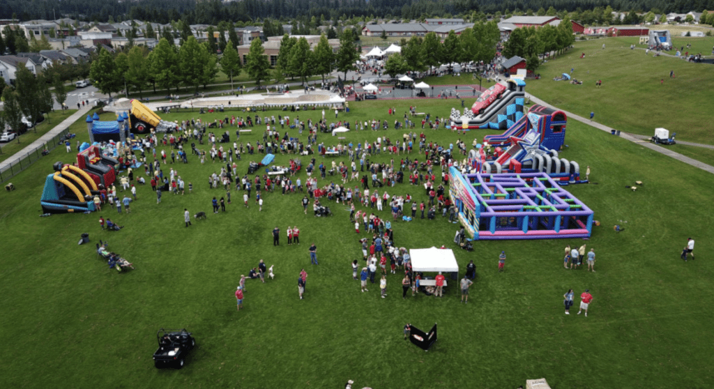 outdoor team building - company picnic with bounce houses